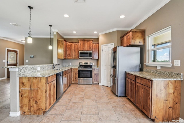 kitchen featuring sink, hanging light fixtures, stainless steel appliances, light stone countertops, and kitchen peninsula