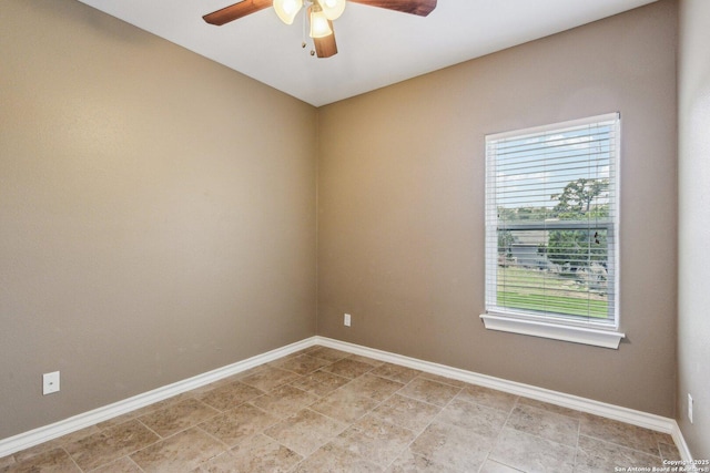 spare room with ceiling fan