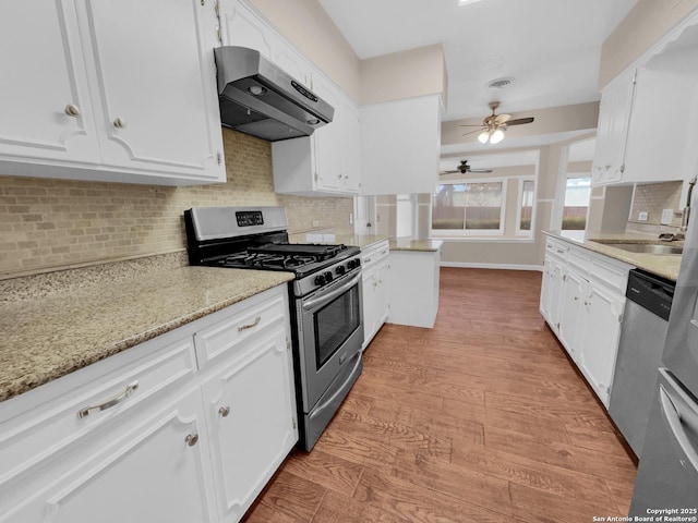 kitchen featuring white cabinetry and stainless steel appliances