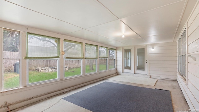 unfurnished sunroom featuring plenty of natural light