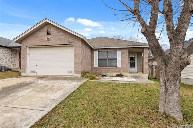 view of front of house featuring a garage and a front yard