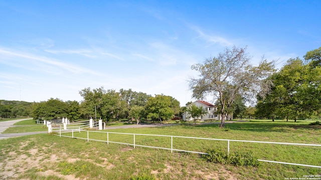 view of yard with a rural view