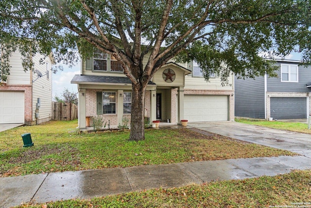 view of front of property featuring a garage and a front yard