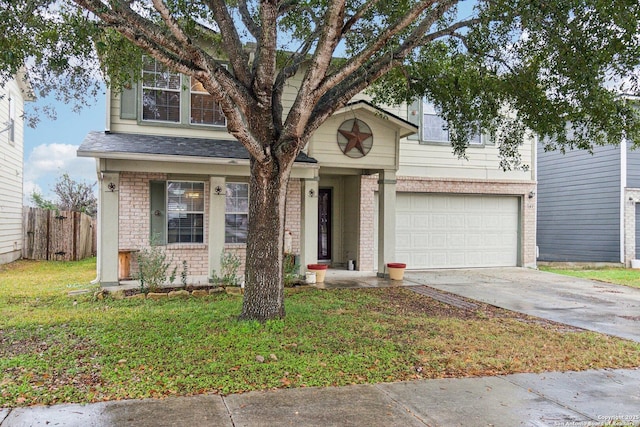 view of front of property featuring a garage and a front lawn