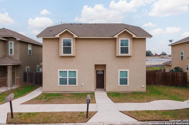 view of front of home featuring a front yard