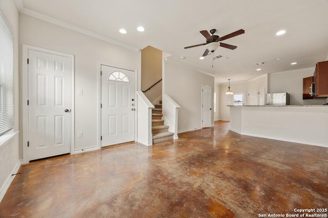 interior space with crown molding, concrete floors, and ceiling fan