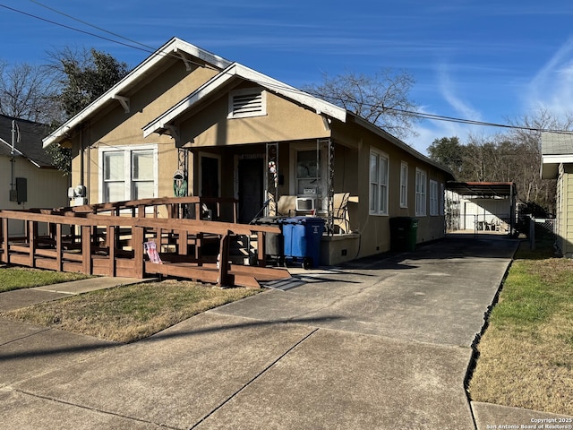 bungalow-style house with a deck