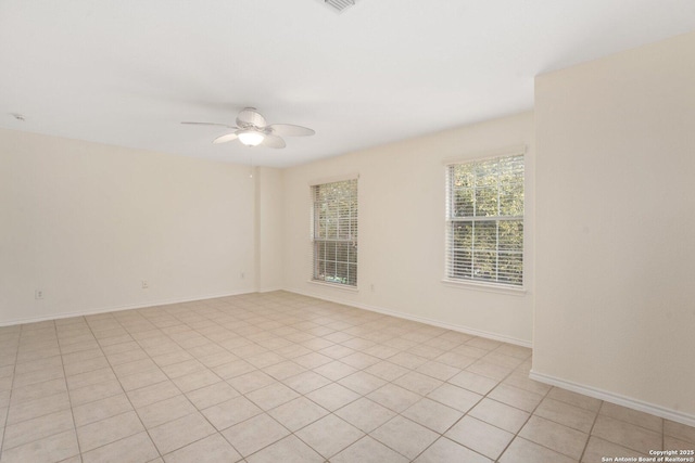 spare room with ceiling fan