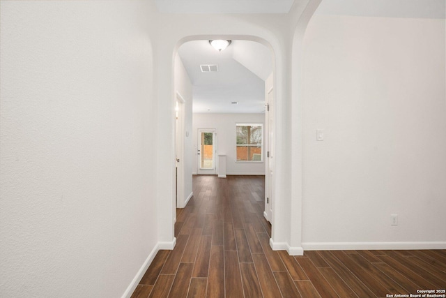 corridor featuring dark hardwood / wood-style floors