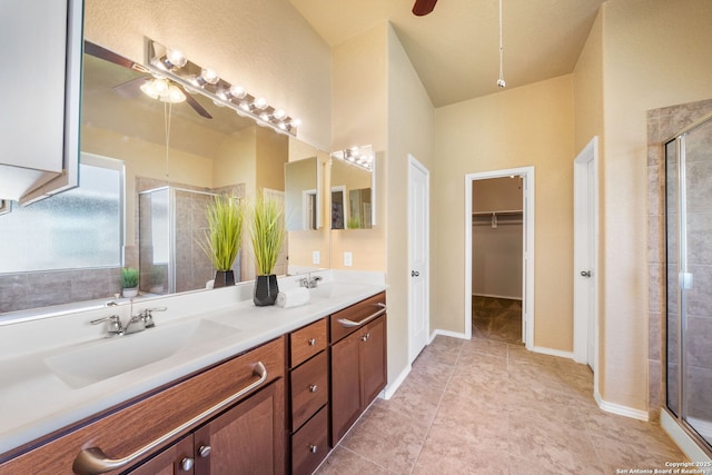 bathroom featuring vanity, an enclosed shower, tile patterned floors, and ceiling fan