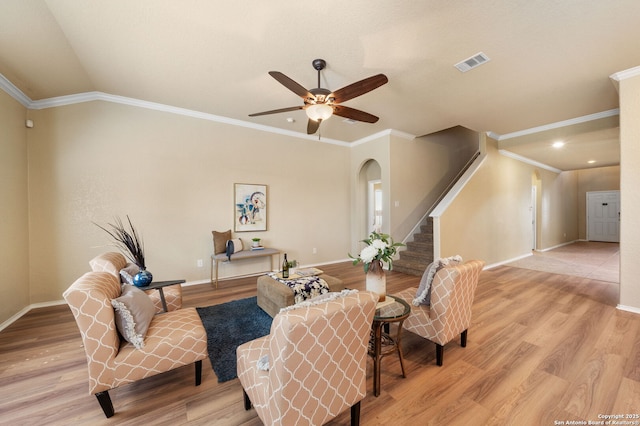 sitting room featuring crown molding, ceiling fan, and light hardwood / wood-style floors