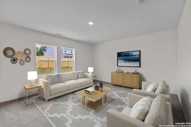 living room with light colored carpet