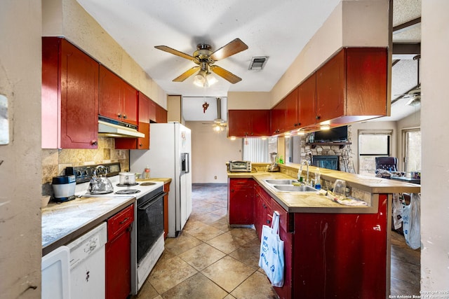 kitchen with light tile patterned flooring, sink, tasteful backsplash, ceiling fan, and white appliances