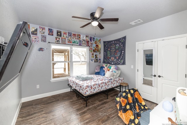 bedroom featuring dark wood-type flooring and ceiling fan