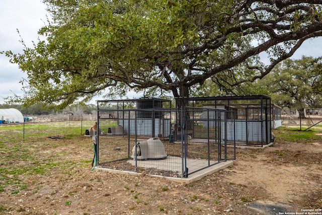 view of yard with an outdoor structure