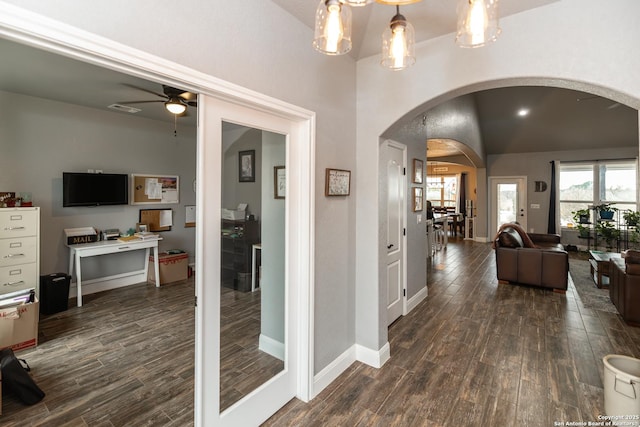 hallway featuring dark hardwood / wood-style flooring