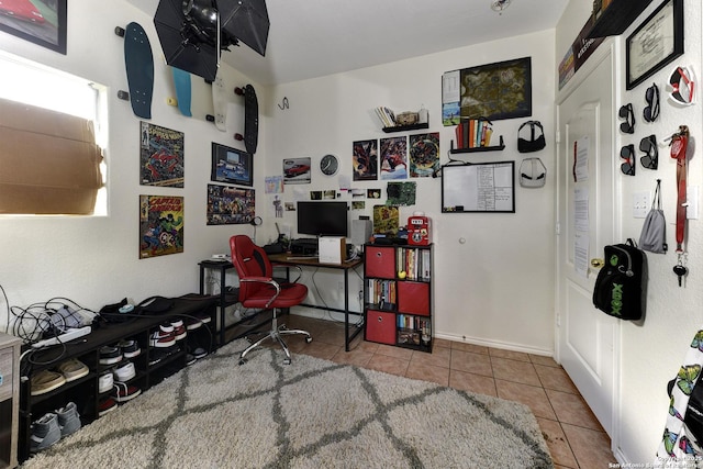 home office featuring light tile patterned floors