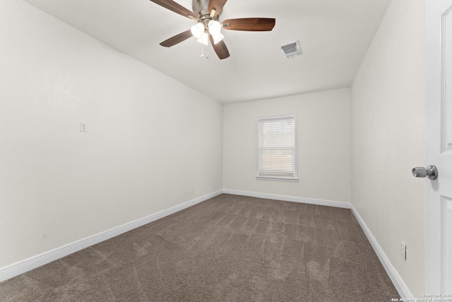 carpeted empty room featuring ceiling fan