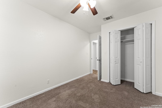 unfurnished bedroom with carpet floors, a closet, and ceiling fan