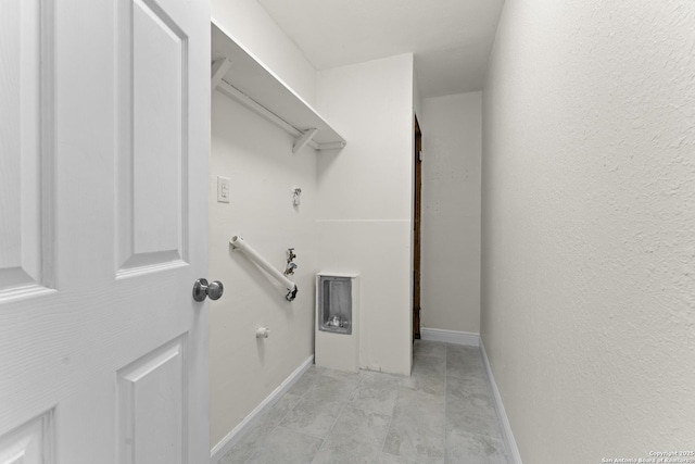 washroom featuring hookup for a gas dryer