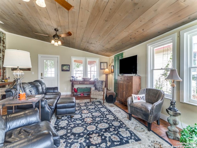 tiled living room featuring ceiling fan, lofted ceiling, and wooden ceiling