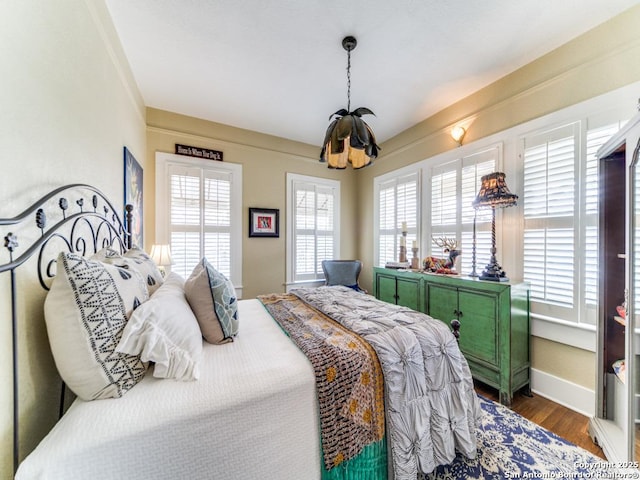 bedroom featuring hardwood / wood-style floors