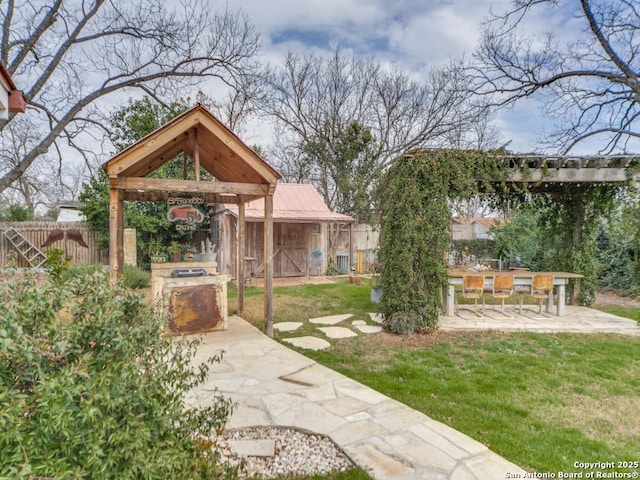 exterior space featuring a gazebo, a yard, and a patio