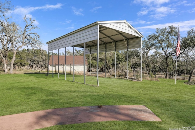 view of yard with a carport