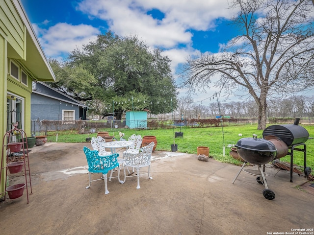 view of patio with a grill