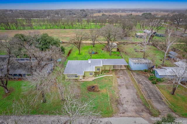 birds eye view of property with a rural view