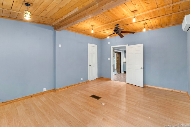 unfurnished room featuring beamed ceiling, ceiling fan, wood ceiling, and light hardwood / wood-style floors