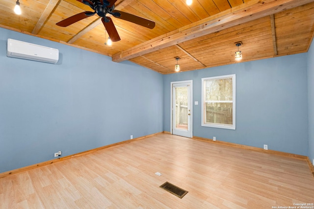 spare room featuring lofted ceiling with beams, light hardwood / wood-style flooring, wooden ceiling, an AC wall unit, and ceiling fan