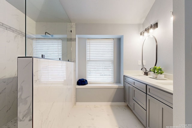 bathroom featuring vanity and a tile shower