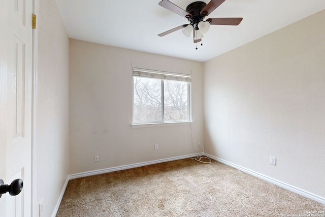 unfurnished room featuring carpet floors and ceiling fan