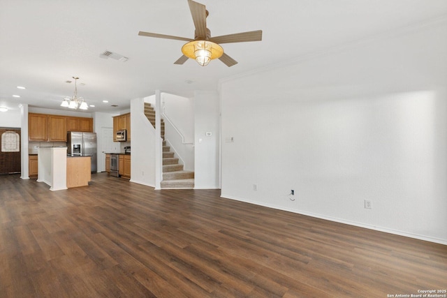 unfurnished living room with recessed lighting, dark wood-style flooring, visible vents, baseboards, and stairway