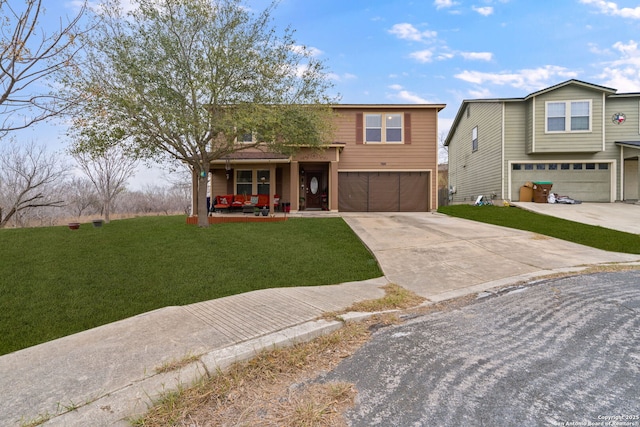 view of front of house featuring a garage, a front lawn, and covered porch