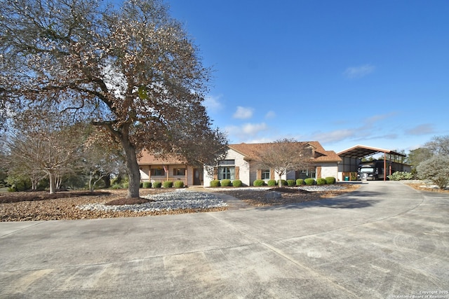 view of front of property with a carport