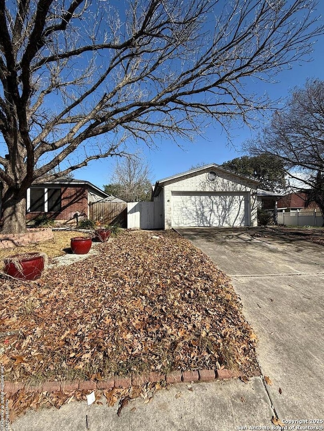 view of side of property with a garage