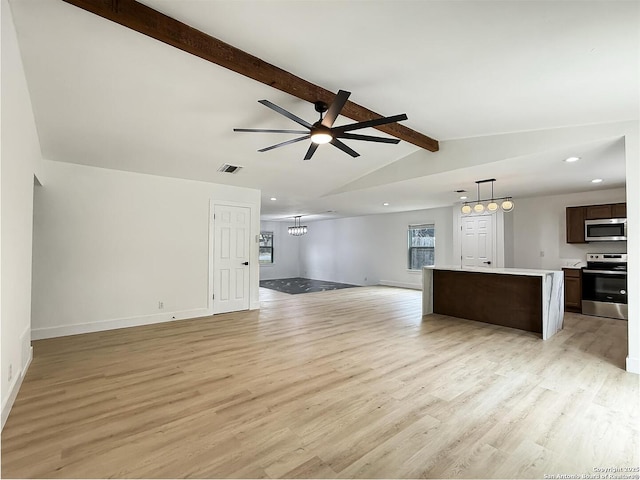 unfurnished living room with ceiling fan, lofted ceiling with beams, and light hardwood / wood-style flooring