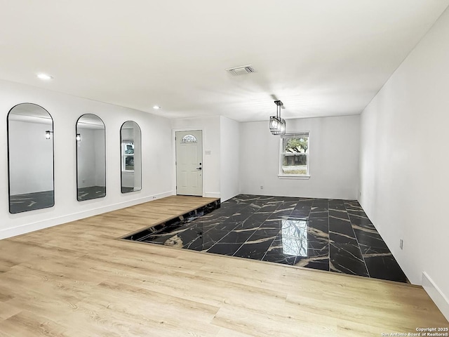 interior space featuring wood-type flooring