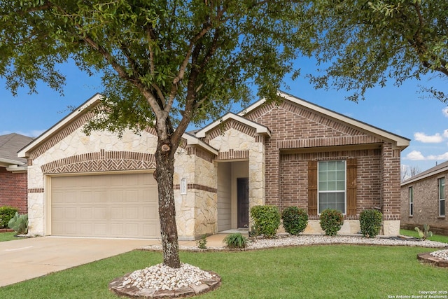 view of front of home featuring a garage and a front lawn