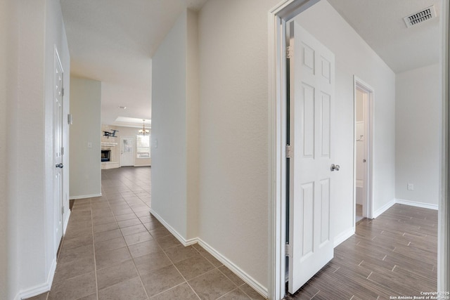 hallway featuring hardwood / wood-style flooring