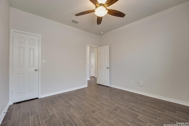 empty room featuring ceiling fan