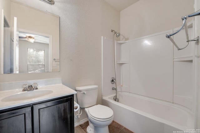 full bathroom featuring vanity, tub / shower combination, tile patterned floors, and toilet