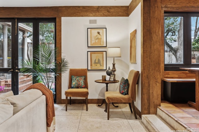 sitting room featuring french doors