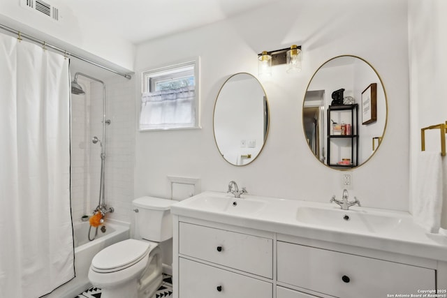 full bathroom with vanity, toilet, and shower / bath combo