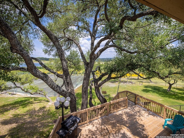 deck featuring a yard