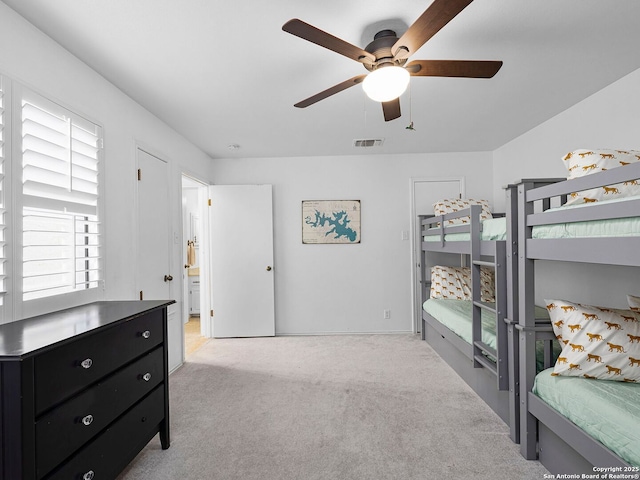1048 Parkview Dr, Canyon Lake, TX 78133 - bedroom featuring light carpet and ceiling fan