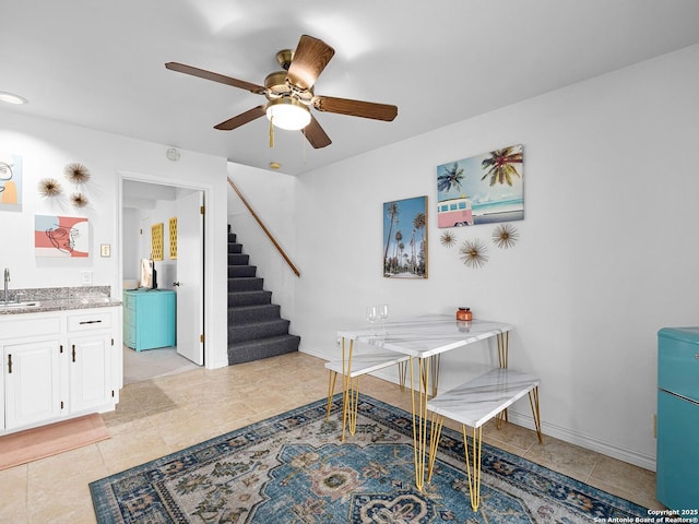 1048 Parkview Dr, Canyon Lake, TX 78133 - tiled dining space featuring ceiling fan and sink