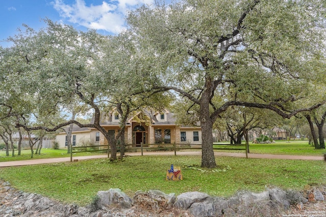 view of front of property with a front lawn